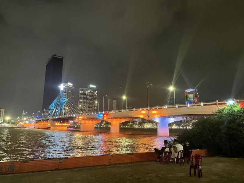 Some of Da Nang’s beautiful bridges, including the famous Dragon Bridge, lit up at night