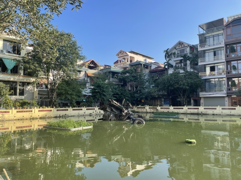 The downed B-52 in the same spot it was shot down, in Huu Tiep Lake, Hanoi, Vietnam