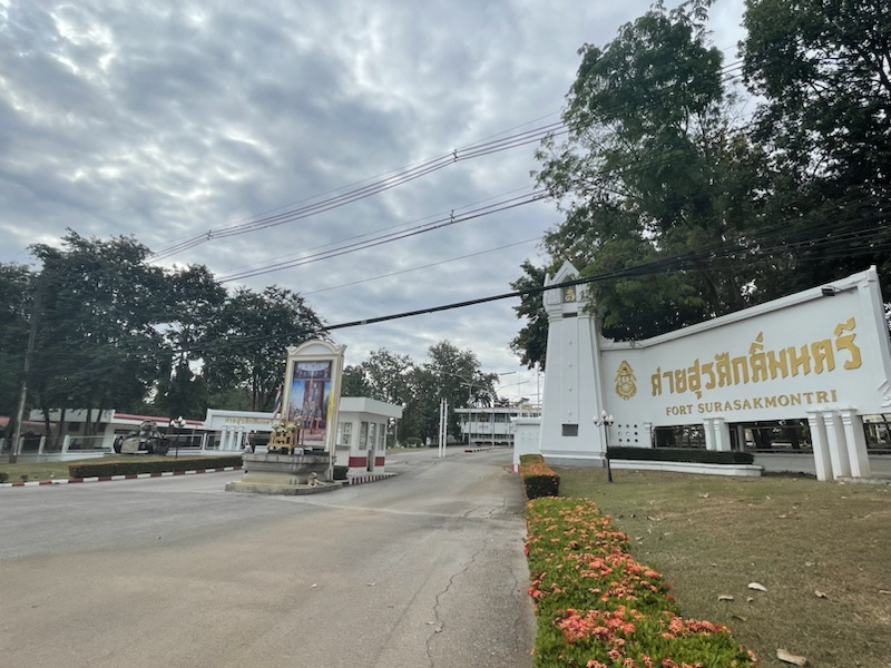 Our Grab car pulled up outside the entrance of Fort Surasakmontri army base, Lampang, Thailand 