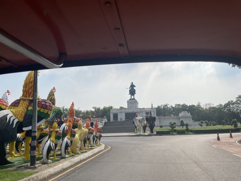 The rooster statue roundabout right by Wat Phu Khao Thong