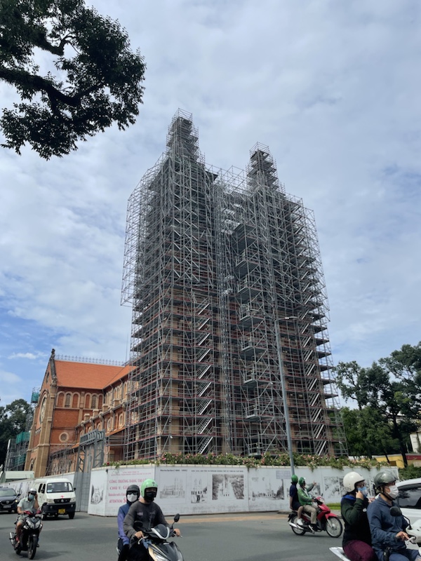 The Notre-Dame Cathedral Basilica of Saigon, Ho Chi Minh City, Vietnam, surrounded by scaffolding and closed to the public.