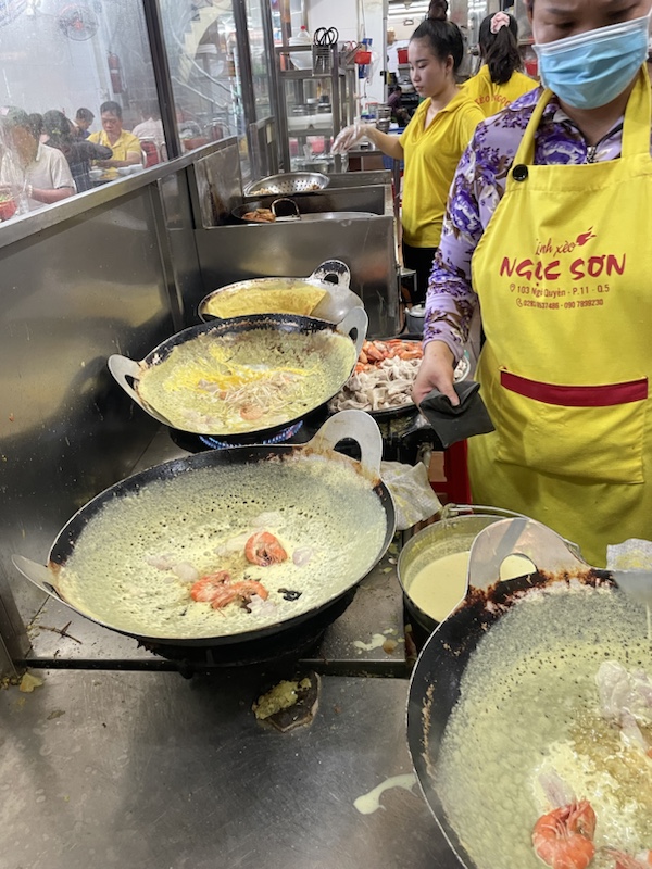 Crispy pancakes filled with prawns and pork at Bánh Xèo Ngọc Sơn, Ho Chi Minh City, Vietnam
