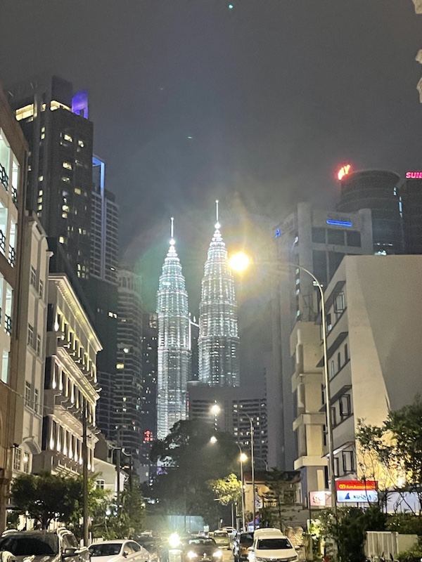 The Petronas Towers, Kuala Lumpur, Malaysia, looking beautifully lit up​
