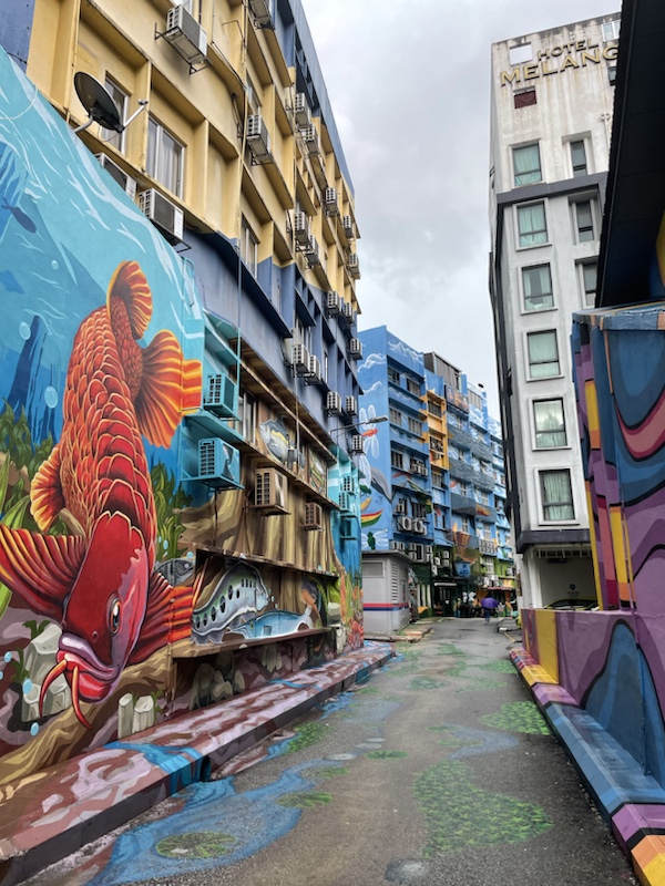 There’s lots of brightly coloured street art in the lanes around Jalan Alor and Jalan Rembia in Kuala Lumpur, Malaysia 