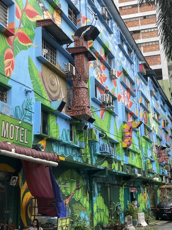 There’s lots of brightly coloured street art in the lanes around Jalan Alor and Jalan Rembia in Kuala Lumpur, Malaysia 