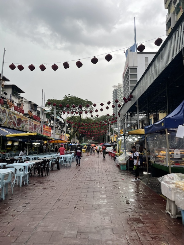 Jalan Alor is a famous foodie street in Kuala Lumpur, Malaysia but was very quiet on a wet afternoon 
