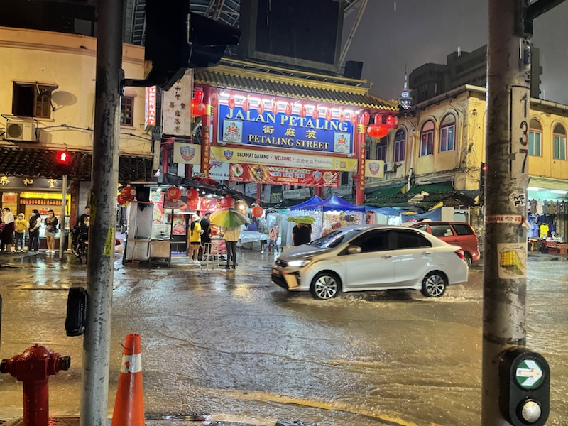 It was extremely wet when we visited Petaling Street Market, Kuala Lumpur, Malaysia 